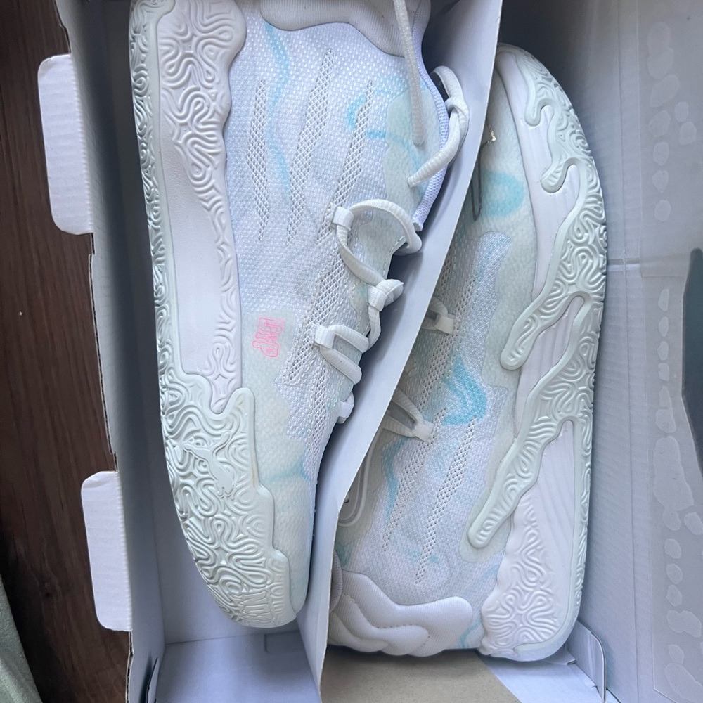 Puma White Sneakers with Light Blue Accents
